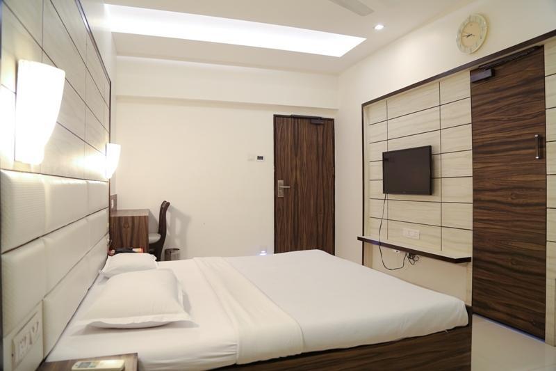 Golden Plaza Ahmedabad Quarto foto